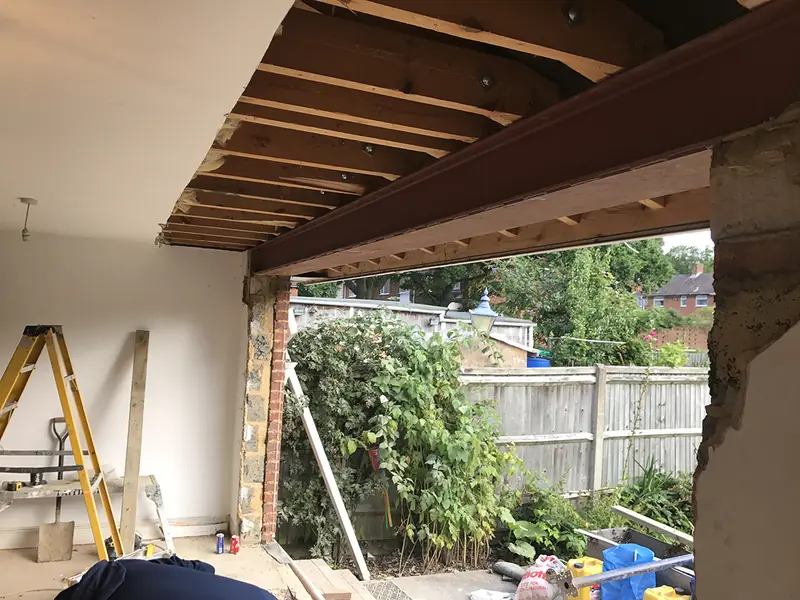 Steel beam supporting a new structural opening